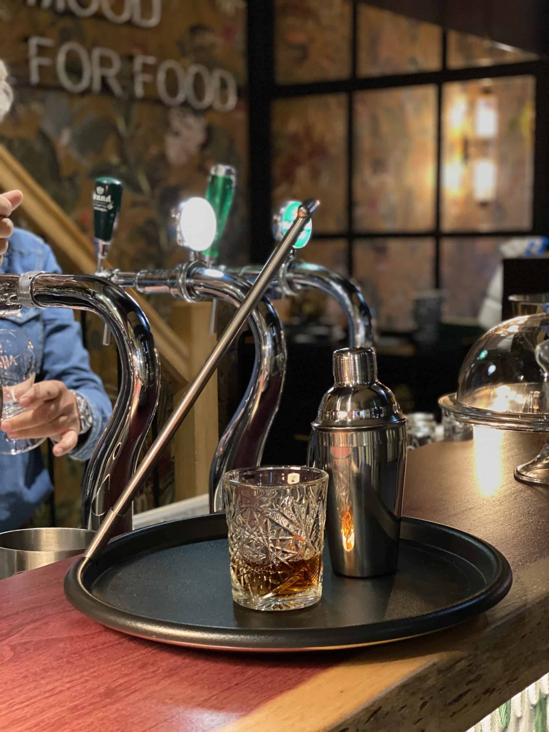 The Balance Tray with a glass of whisky on a bar